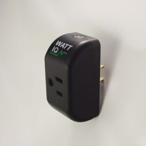 A black smart plug with "WattIQ" written on it against a plain white background.