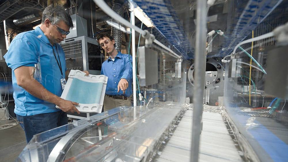 NREL engineers conduct research on a DeVap prototype at the HVAC Systems Laboratory