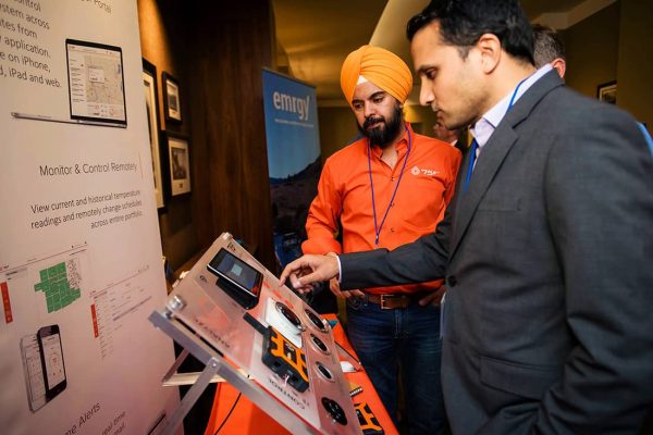 Deepinder Singh, CEO of IN2 portfolio company 75F, demonstrates his company's technology at an IN2 ecosystem event