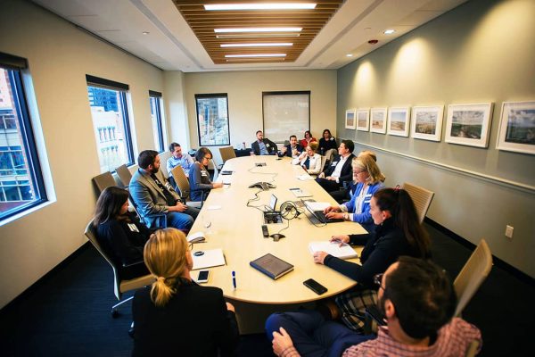 Board members seated at conference table