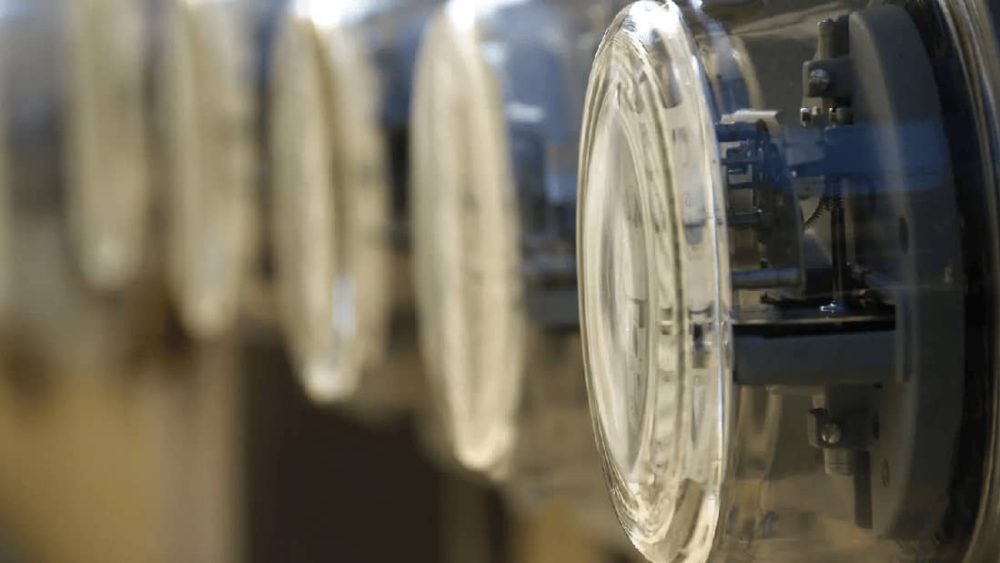 Close-up of multiple glass electric meters