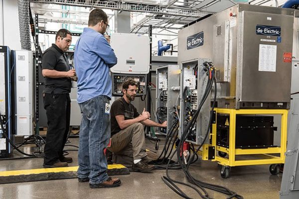 NREL engineers testing a Go Electric inverter
