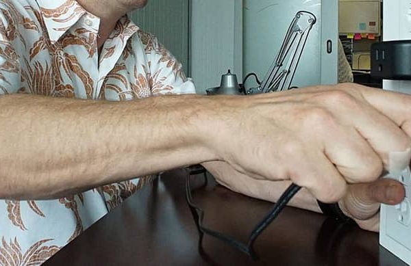 Man plugs in charger