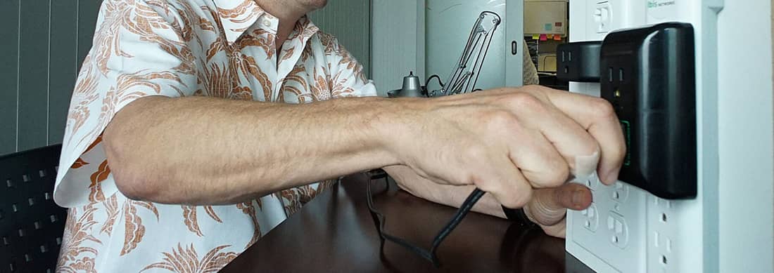 Man plugs in charger