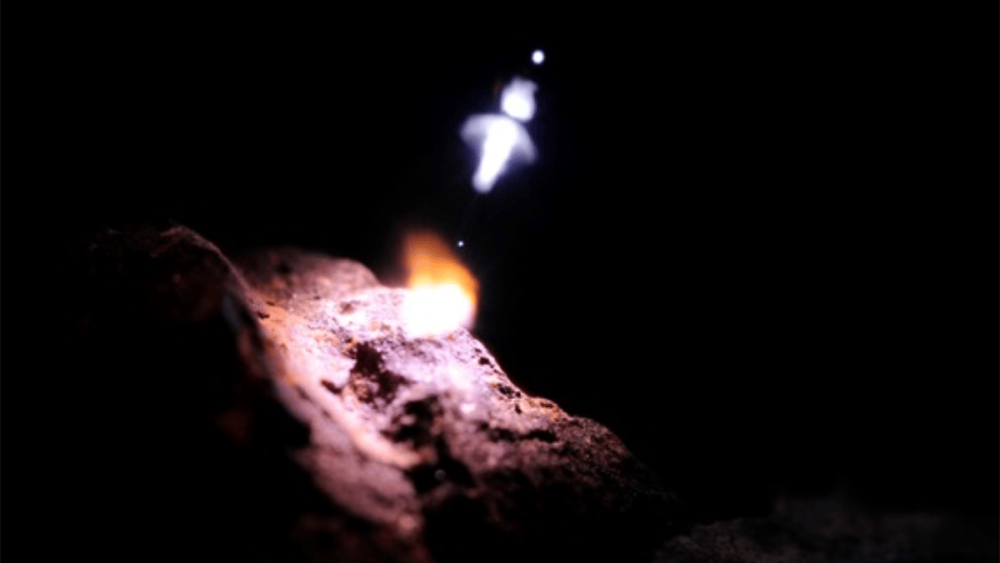 A small flickering flame