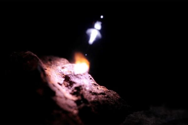 A small flickering flame