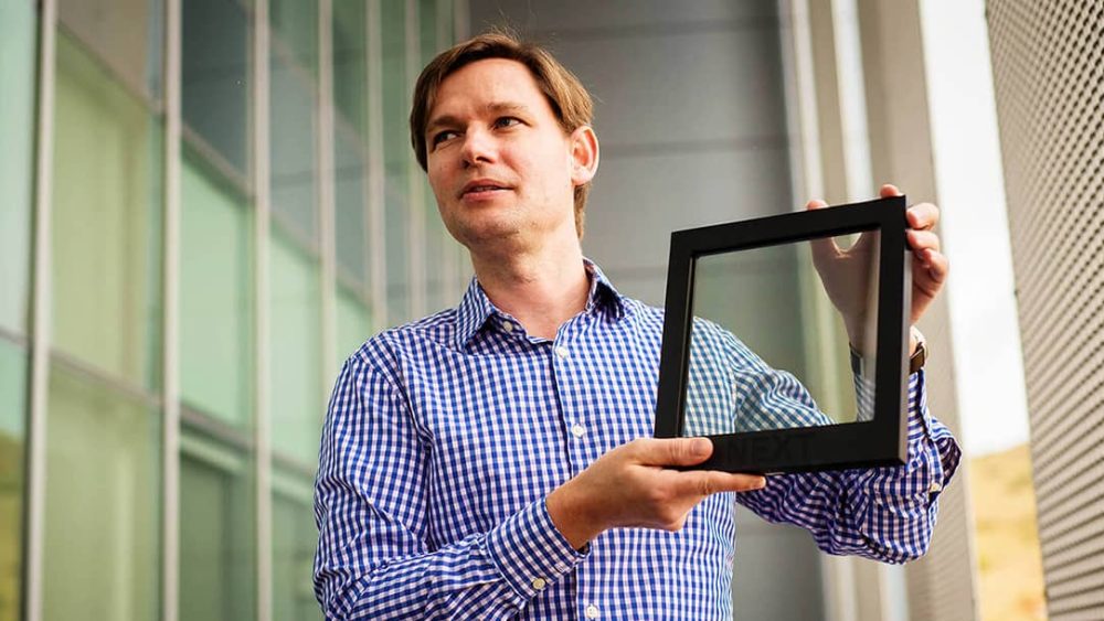 Man holds solar frame