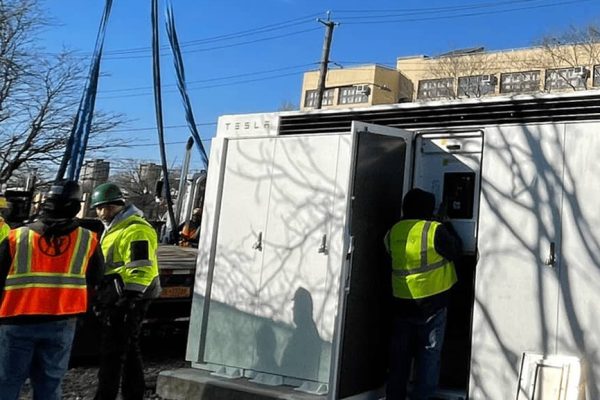 Construction workers at a battery storage project site