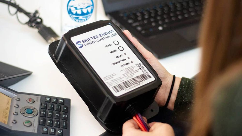 Close up of hands holding battery