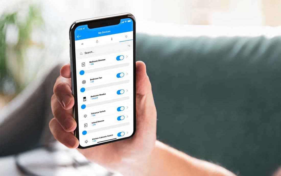 Person holding phone with STRATIS mobile application
