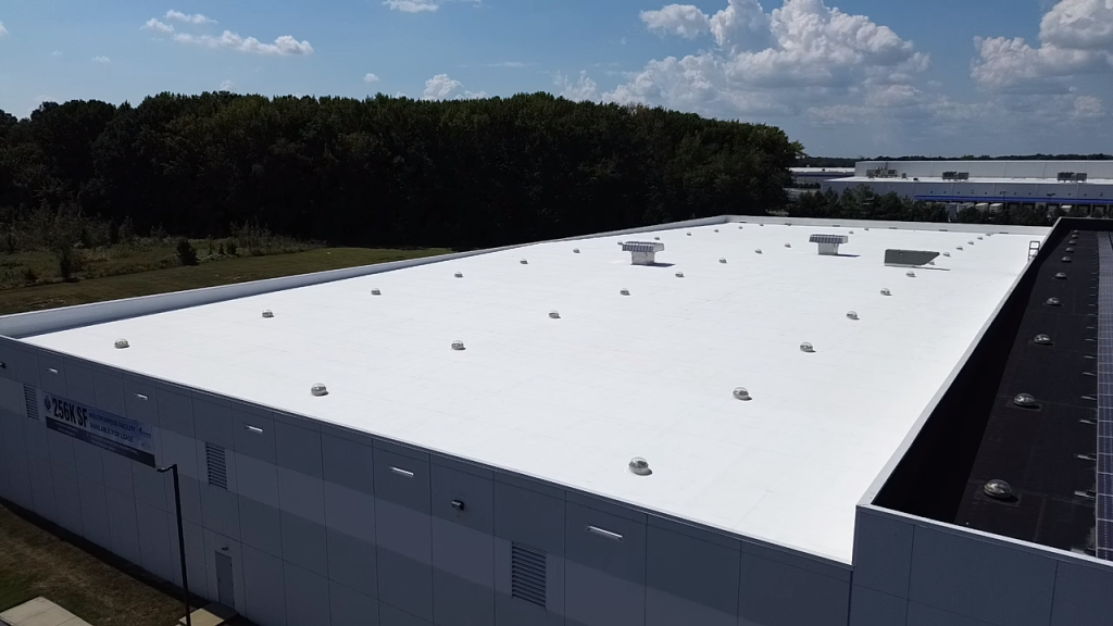 A wide view of a rooftop with a white coating.